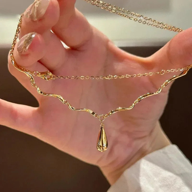 The Liquid Drop Tassel Necklace – Vintage Glossy Irregular Collar Chain.