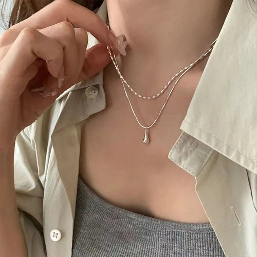 The Liquid Drop Tassel Necklace – Vintage Glossy Irregular Collar Chain.