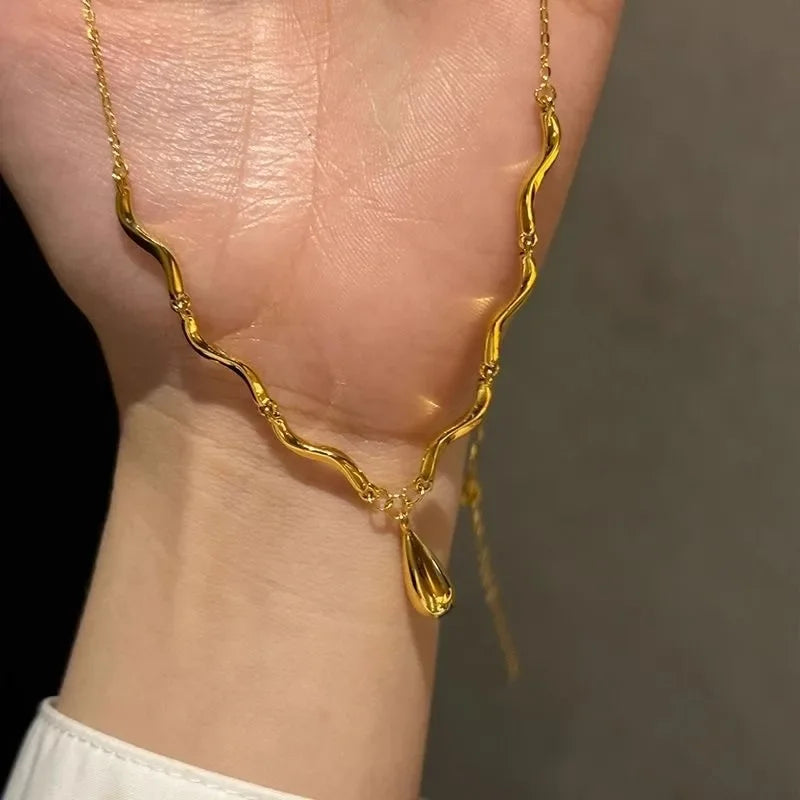 The Liquid Drop Tassel Necklace – Vintage Glossy Irregular Collar Chain.