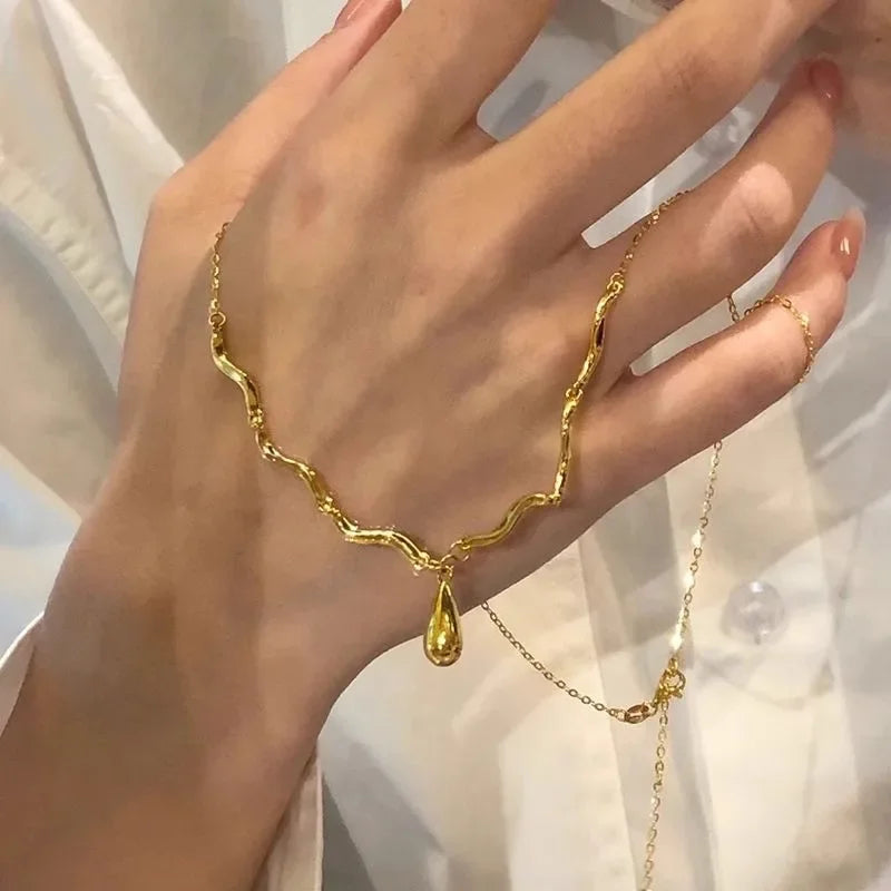 The Liquid Drop Tassel Necklace – Vintage Glossy Irregular Collar Chain.